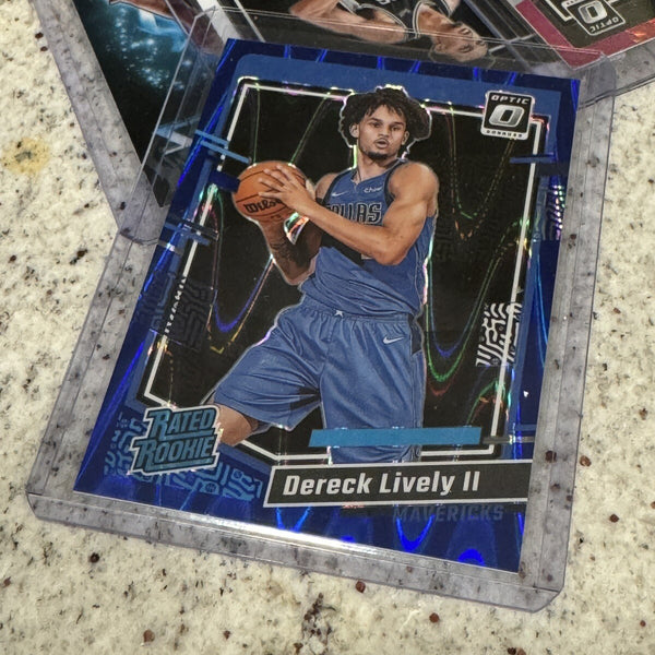 Dereck Lively II 2023-24 Prizm Optic Rated Rookie Blue Seismic Prizm /249 RC