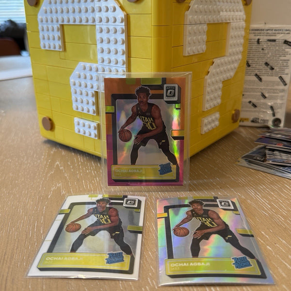 2023 Optic ROOKIE PRIZM NUMBERED /15 Ochai Agbaji Jazz 205 Pink Orange Holo